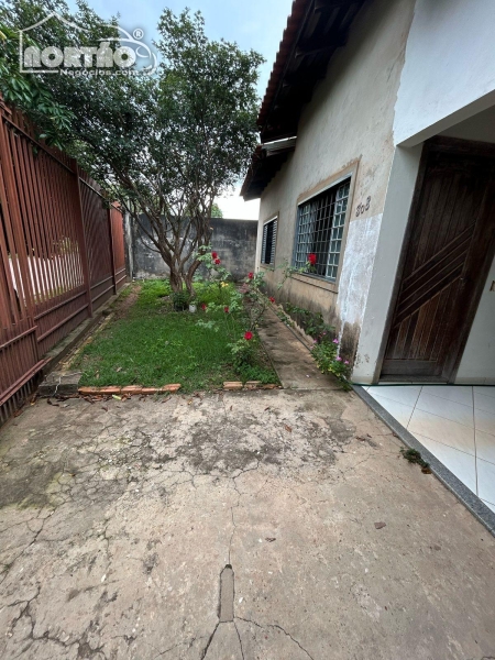 Casa à venda com 3 quartos, 100m² - Foto 1